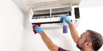 How do I protect the air conditioner from freezing in the winter?