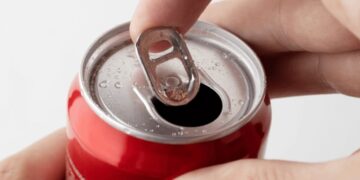 Neither decoration nor decoration - this is the real use of the hole in the ring of the cans... and it's not what we all thought it was for
