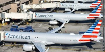Bad news for solo travelers - American Airlines charges passengers flying alone up to 70% more - here's why