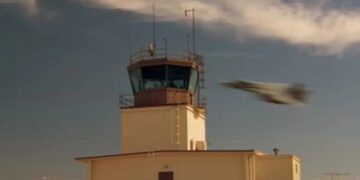 John Chesire, former US Navy F14 Tomcat pilot—the controllers asked me to fly close to the control tower