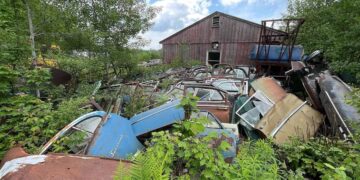 For sale for $400,000—a house in New Hampshire with a garage, 18 acres of land, and nearly 300 abandoned classic cars waiting to be rescued