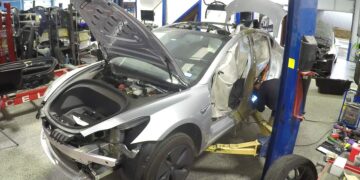 A teenager buys a Tesla Model 3 from Geico for only $15,000, and when he starts it up, he can't believe what he finds on the dashboard