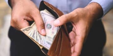 Say Goodbye to paying cash - an expert reveals why paying by card at the supermarket may be ruining your finances without you noticing it