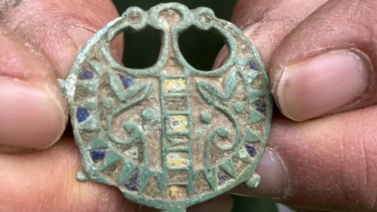 He mistook it for an old toy—a rare Roman bronze brooch has been found in England, having survived hidden underground for two millennia