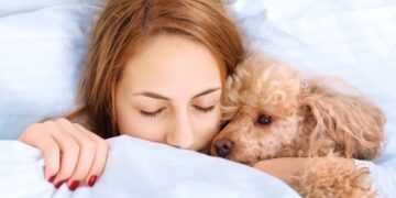 Sleeping with your dog—the truth about emotional benefits, health risks, and what experts say before inviting them into your bed