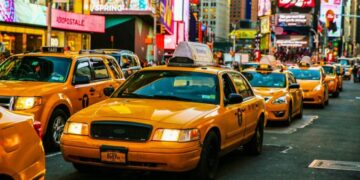 NYC icons weren't always yellow — this is how it all began with Harry Allen, red-green taxis, and the arrival of the first meter taxi in the United States