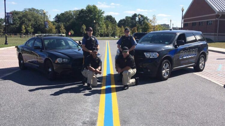 Confirmed—the Federal Highway Administration prohibits blue lines in support of the police for road safety reasons