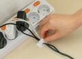 Goodbye to cable clutter at home—the Dollar Tree hack that organizes chargers and headphones for less than a dollar is winning over thousands