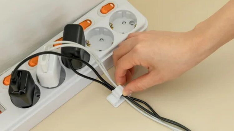 Goodbye to cable clutter at home—the Dollar Tree hack that organizes chargers and headphones for less than a dollar is winning over thousands 1 Goodbye to cable clutter at home—the Dollar Tree hack that organizes chargers and headphones for less than a dollar is winning over thousands