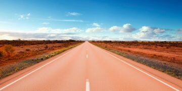 Goodbye to Iowa's gray highways—the northwest corner of the state surprises with roads that turn pink due to the outcropping of Sioux quartzite