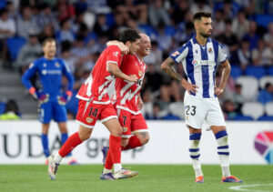 AN SEBASTIAN, SPAIN - AUGUST 18: Sergio Camello of Rayo Vallecano celebrates scoring his team's second goal with teammate Isi Palazon during the La Liga match between Real Sociedad de Fútbol and Rayo Vallecano de Madrid at Reale Arena on August 18, 2024 in San Sebastian, Spain. (Photo by Juan Manuel Serrano Arce/Getty Images)