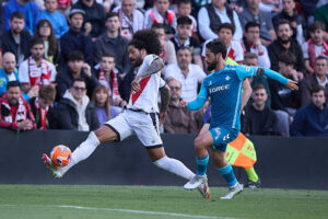 Aridane Hernandez of Rayo Vallecano and Isco of Real Betis battle for the ball during the LaLiga match between Rayo Vallecano and Real Betis at Campo de Fútbol de Vallecas on May 15, 2025 in Madrid, Spain. (Photo by GSI/Icon Sport via Getty Images)